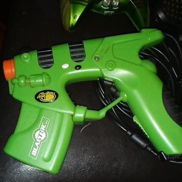 I'm showing my original Xbox console and controllers, gun,and steering wheel - Picture 3 of 4